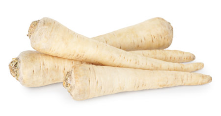 Many raw parsley roots isolated on whiteの写真素材