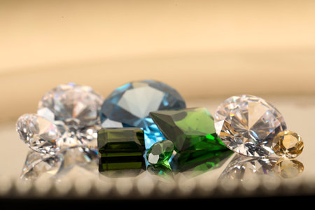 Beautiful shiny colorful gemstones on light background, closeupの写真素材