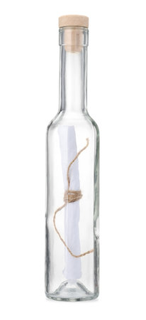 Corked glass bottle with rolled letter isolated on whiteの写真素材