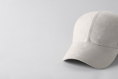 Stylish baseball cap on light grey background. Mockup for designの写真素材
