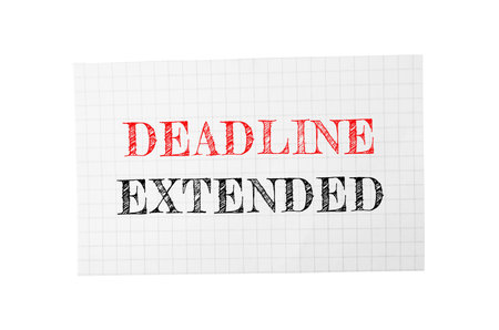 Deadline Extended text on paper isolated on whiteの写真素材