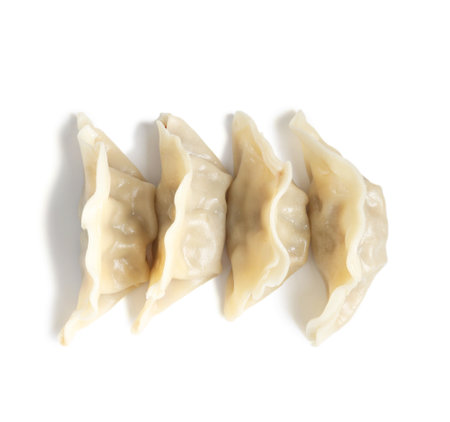 Tasty boiled gyoza (dumplings) isolated on white, top viewの写真素材