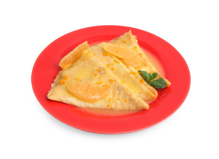 Plate with tasty crepes isolated on whiteの写真素材
