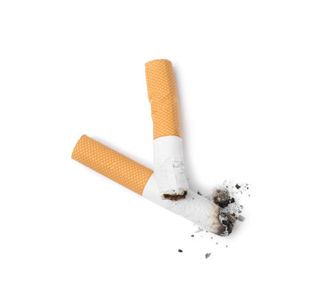 Two cigarette butts isolated on white, top view. Smoking habitの写真素材