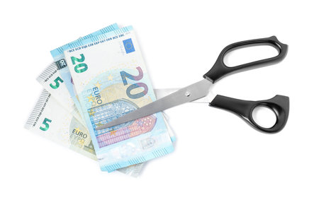 Euro banknotes and scissors isolated on white, top viewの写真素材