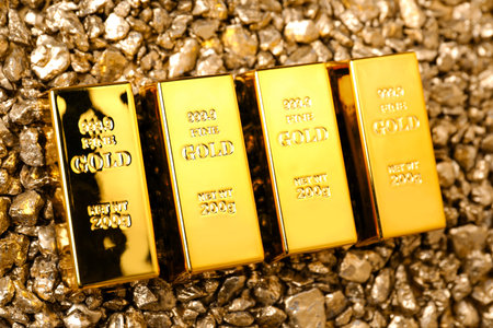 Gold nuggets and bars as background, above viewの写真素材
