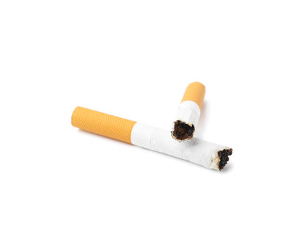 Two cigarette butts isolated on white. Smoking habitの写真素材