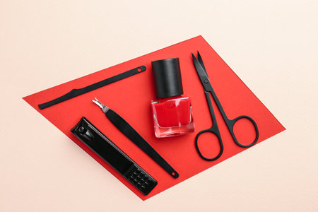 Set of pedicure tools on color background, flat layの写真素材