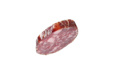 Piece of delicious dry cured sausage isolated on white