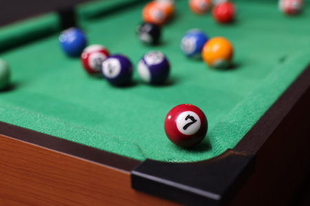 Many colorful billiard balls on green table, closeupの写真素材