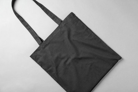 One shopping bag on grey background, top view. Mockup for designの写真素材