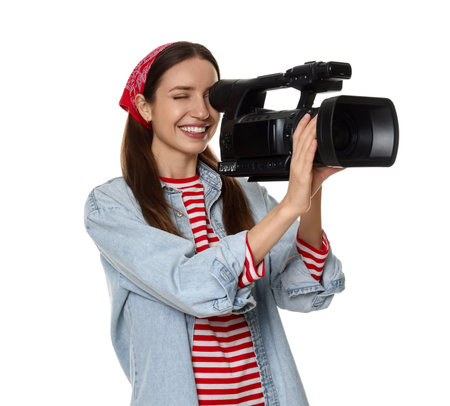 Happy woman with professional video camera on white backgroundの写真素材