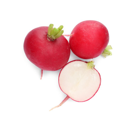 Whole and cut radishes isolated on white, top viewの写真素材