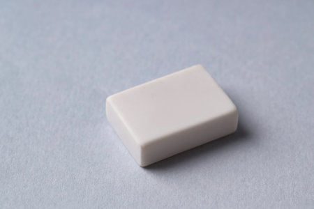 One eraser on gray background, closeup viewの写真素材