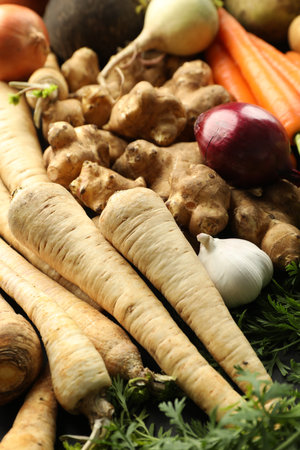 Different raw root vegetables as background, closeupの写真素材