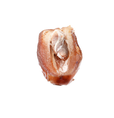 Half of tasty dried date isolated on whiteの写真素材