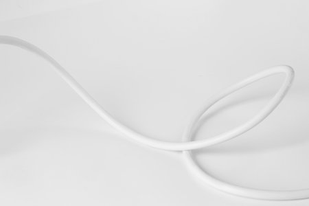 One insulated electrical wire isolated on whiteの写真素材