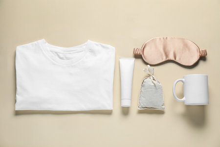 Different blank items on beige background, flat lay. Mockup for designの写真素材