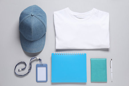 Different blank items for branding on grey background, flat lay. Mockup for designの写真素材