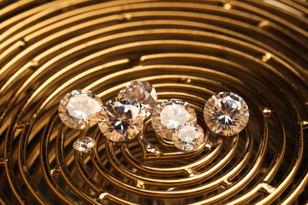 Beautiful shiny gemstones on golden tray, closeupの写真素材