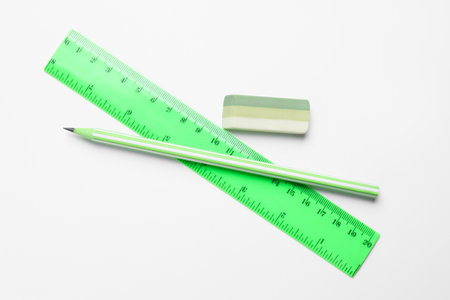 Eraser, pencil and ruler on white background, flat layの写真素材