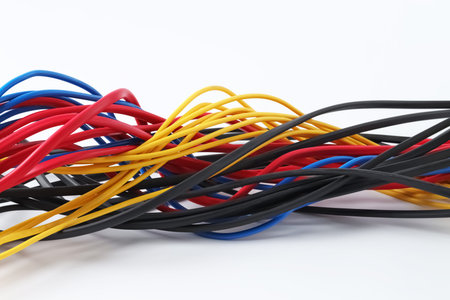 Many colorful electrical wires isolated on white