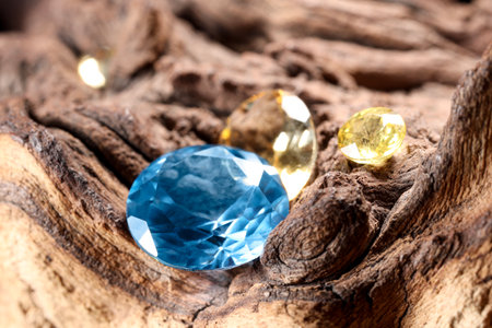 Beautiful shiny colorful gemstones on stone, closeupの写真素材