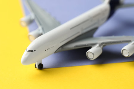 One plane model on color background, closeup