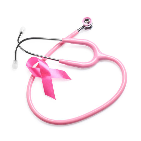 Breast cancer awareness. Pink ribbon and stethoscope isolated on whiteの写真素材