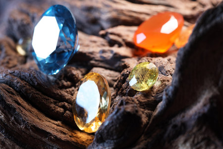 Beautiful shiny colorful gemstones on stone, closeupの写真素材