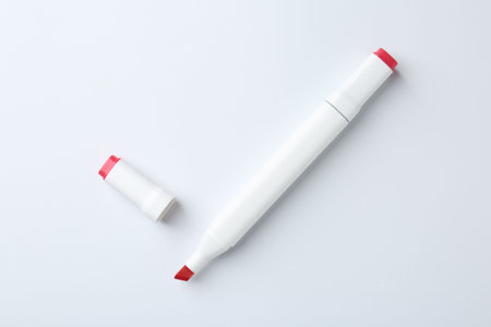 One color double sided marker on white background, top viewの写真素材