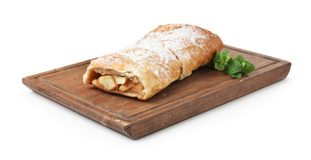 Delicious strudel with apples, powdered sugar and mint on whiteの写真素材