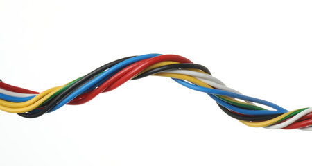 Many colorful electrical wires on white background