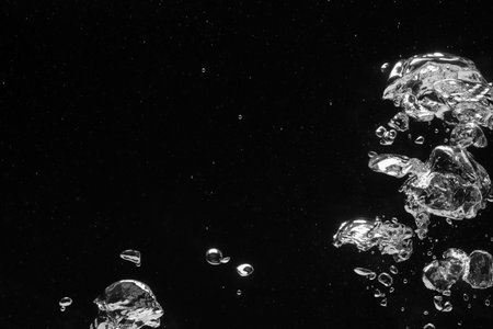 Many water bubbles on dark background, closeup. Space for textの写真素材