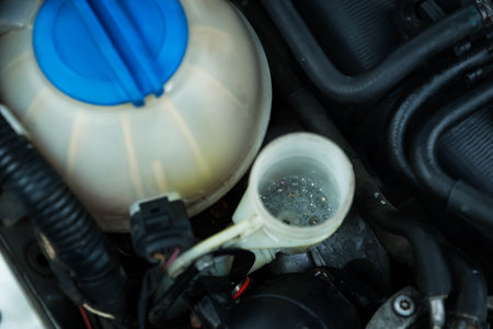 Windshield washer reservoir with fluid, closeup viewの写真素材