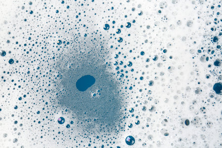 Foam with bubbles as background, top view