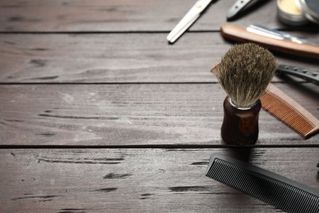 Many different barber's tools on wooden table, closeup. Space for textの写真素材