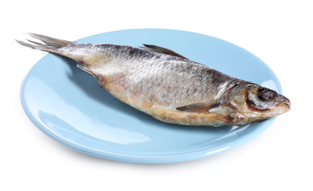 Dried salted roach fish isolated on whiteの写真素材