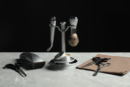 Many different barber's tools on light grey table, closeupの写真素材