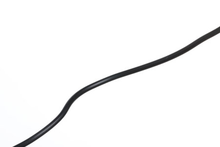 One black electrical wire on white backgroundの写真素材