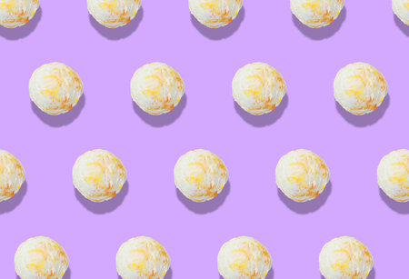 Pattern of delicious ice cream scoops on violet backgroundの写真素材