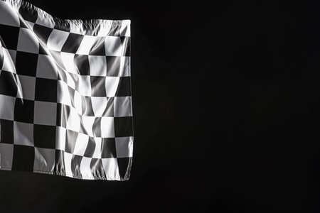 One racing checkered flag on black background, space for textの写真素材