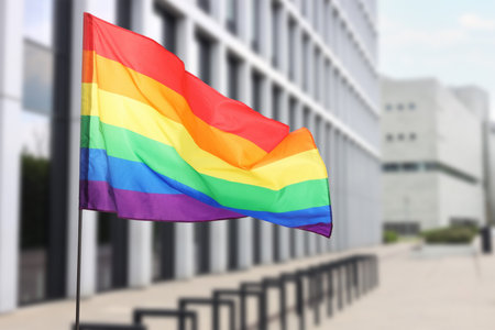 flag fluttering on city street, selective focusの写真素材
