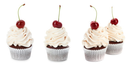 Tasty cupcakes with cream and cherries isolated on white, setの写真素材