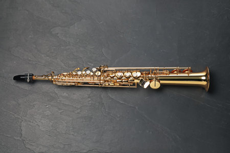 Jazz. One saxophone on black table, top viewの写真素材