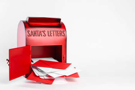 Santa Claus mail box with letters on white background, space for text. Christmas tradition