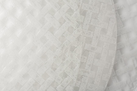 Edible rice paper sheets as background, top view