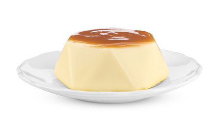 Delicious pudding with caramel sauce isolated on whiteの写真素材