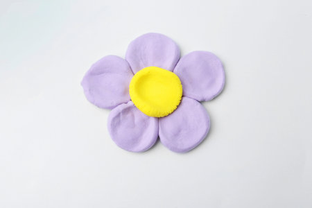 Flower made from play dough on light grey background, top viewの写真素材