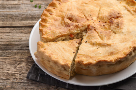 Delicious fresh homemade pie on wooden table, closeupの写真素材